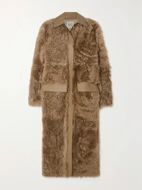 Leather-trimmed shearling coat