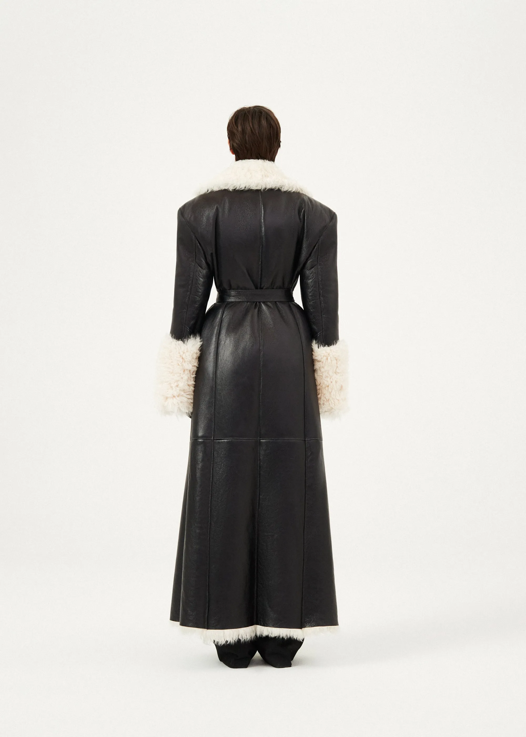 Long belted shearling leather coat in black