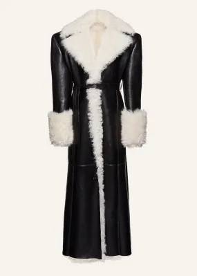 Long belted shearling leather coat in black